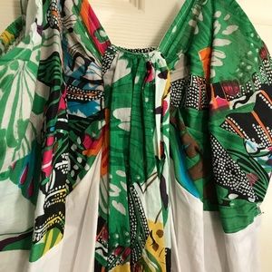 Maxi dress w/ adjustable straps. Stretchy smocking in the back.